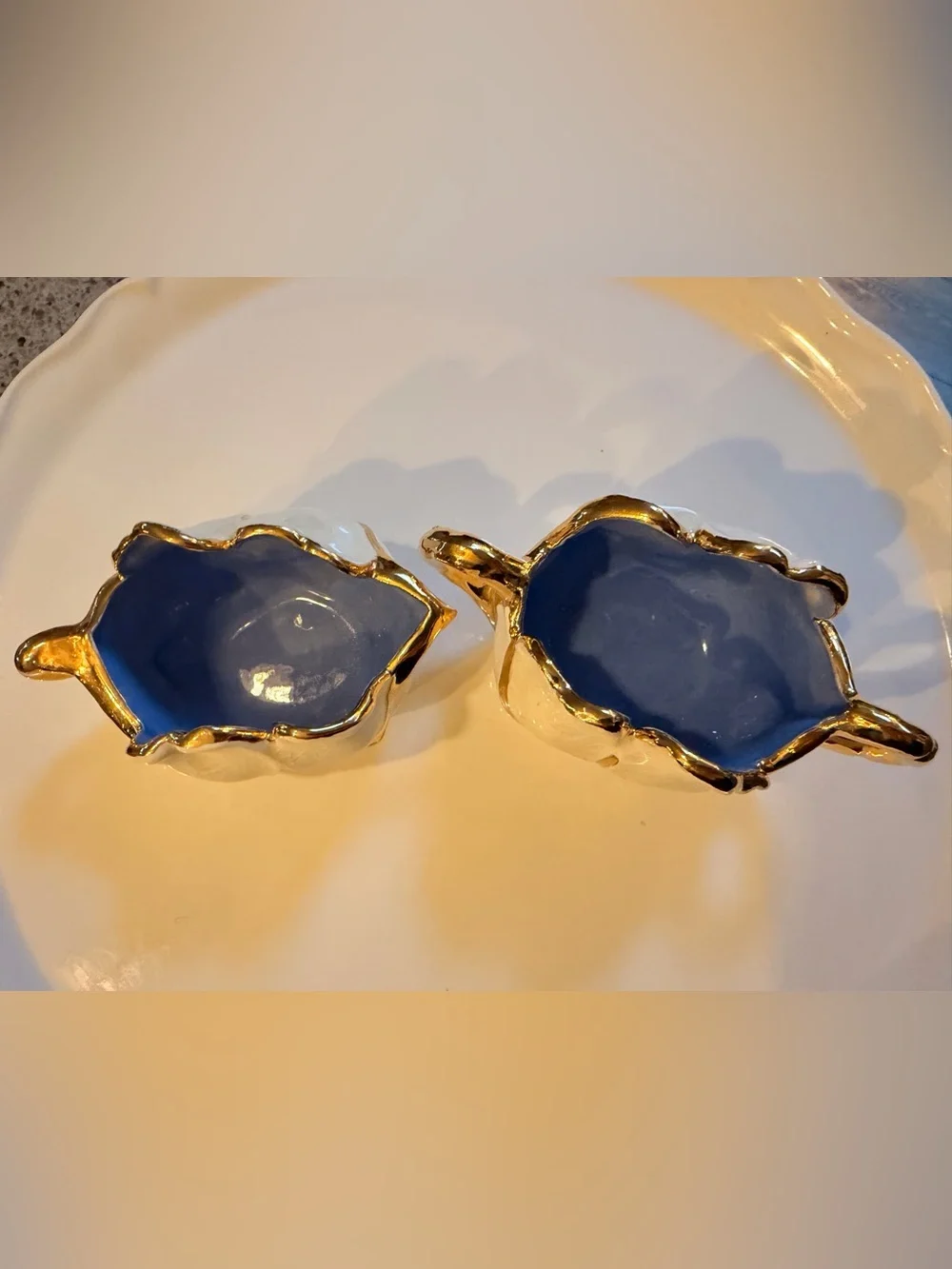 Vintage California Crafts porcelain flower-shaped sugar and creamer set.